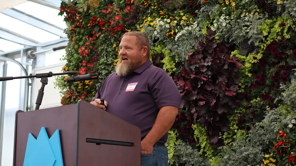 Moose Mountcastle speaking at the podium