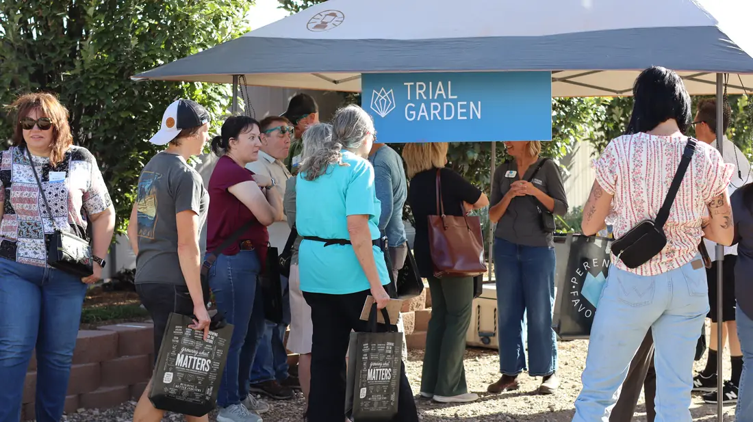 Guests gathered under the Trial Garden tent
